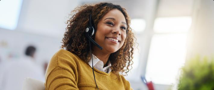 Call center agent speaking to customer 