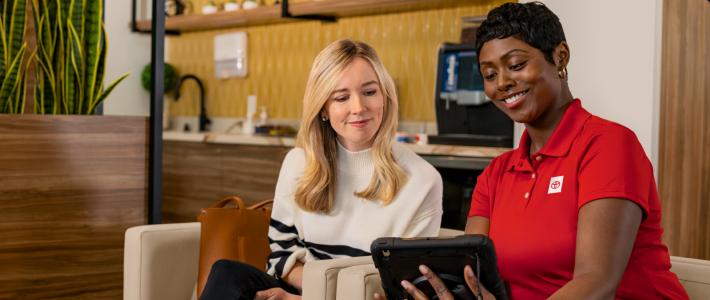 Toyota Insurance agent assisting customer